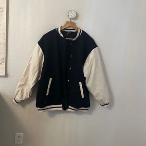 Black and cream Over sized bomber jacket, never worn